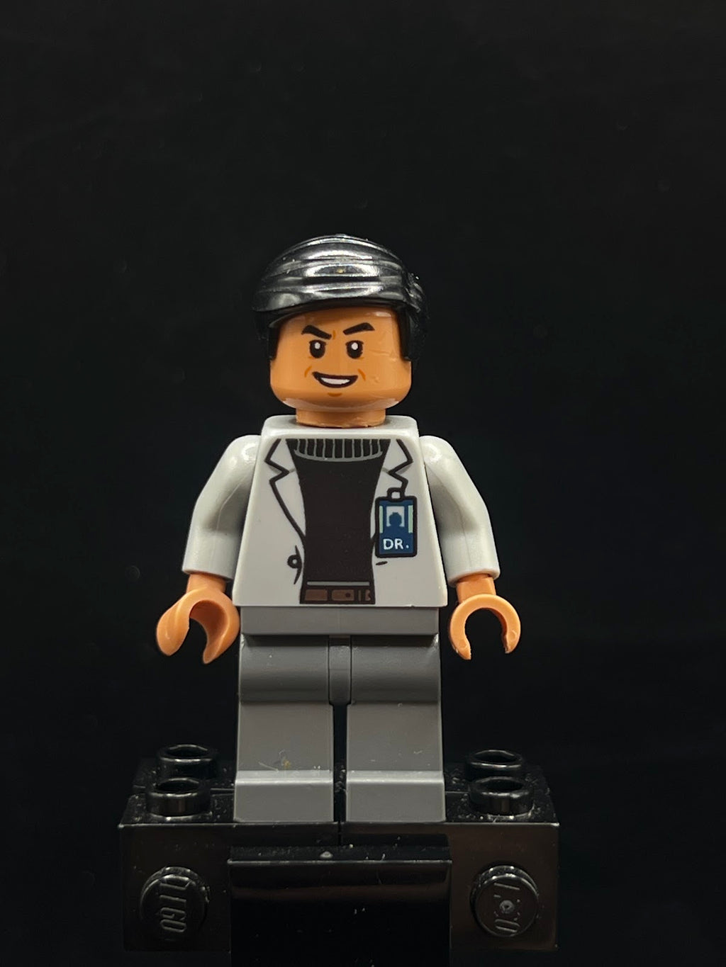 Dr. Henry Wu - Light Bluish Gray Jacket, Smile / Angry Frown - Foto real - DagaBlocks