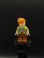 Claire Dearing - Olive Green Jacket over Sand Green Shirt, Reddish Brown Legs - Foto real - DagaBlocks