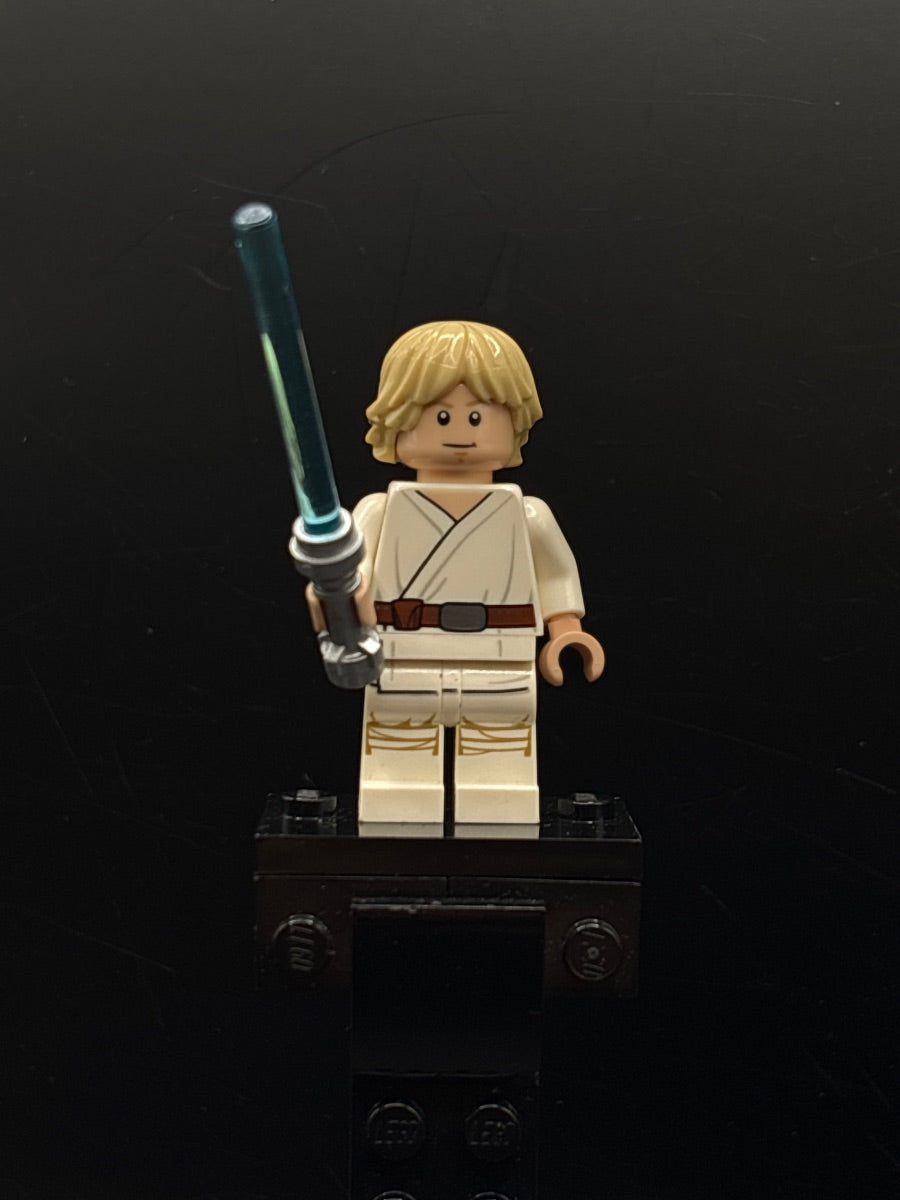 LEGO Minifigura Luke Skywalker (Tatooine, White Legs, Stern / Smile Face Print) - Star Wars — frente