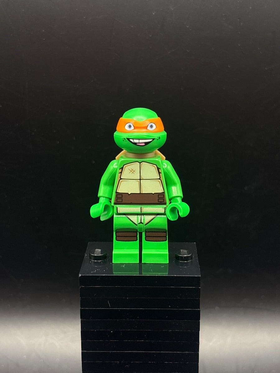 LEGO Minifigura Michelangelo, Grin - Teenage Mutant Ninja Turtles — frente