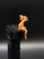 LEGO Minifigura Salacious B. Crumb - Star Wars — costado
