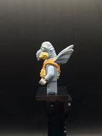 LEGO Minifigura Watto - Sand Blue, Printed Head, Dark Bluish Gray Hands - Star Wars — costado